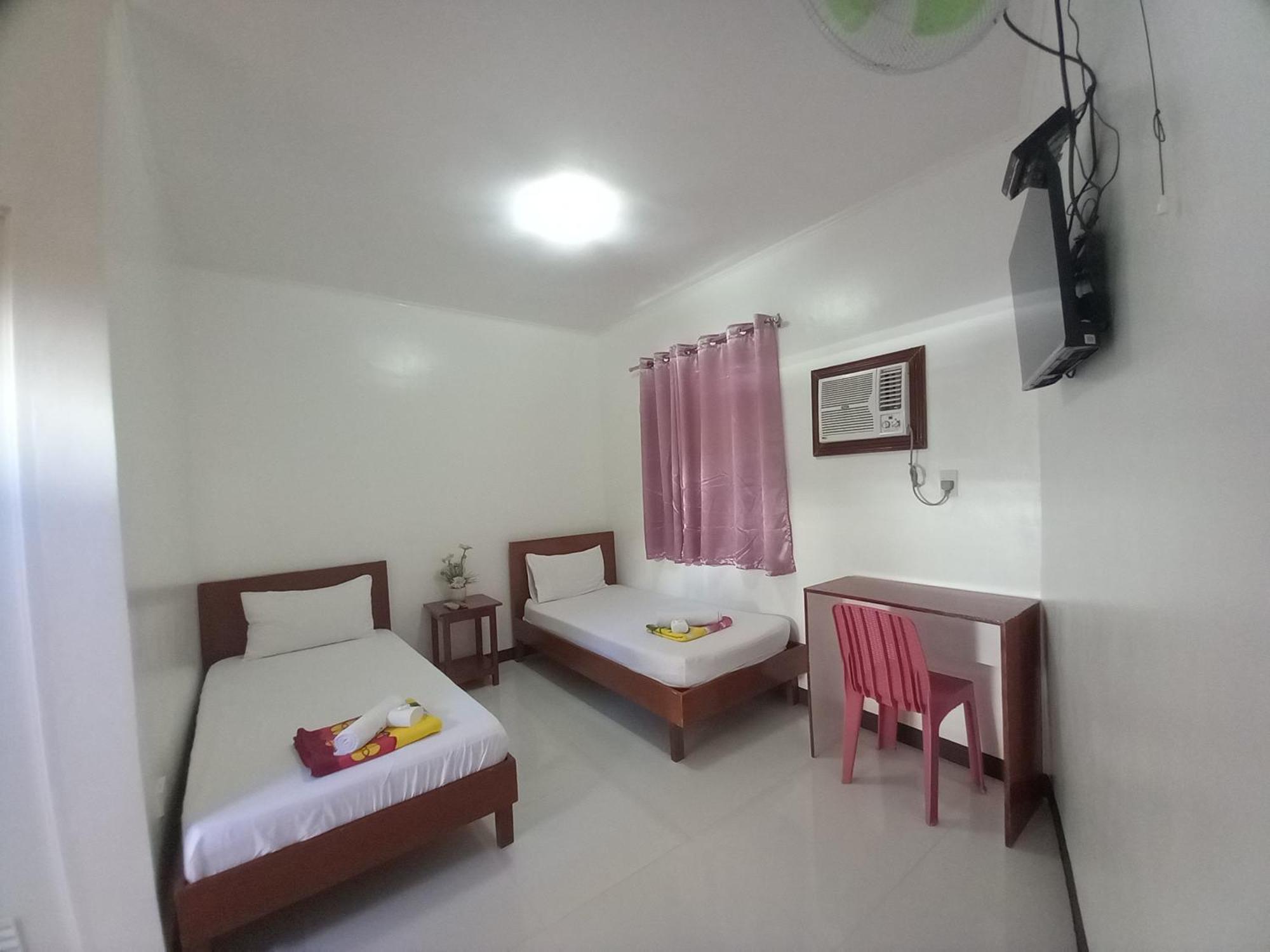 Alinchlo Hotel Легаспи Номер фото