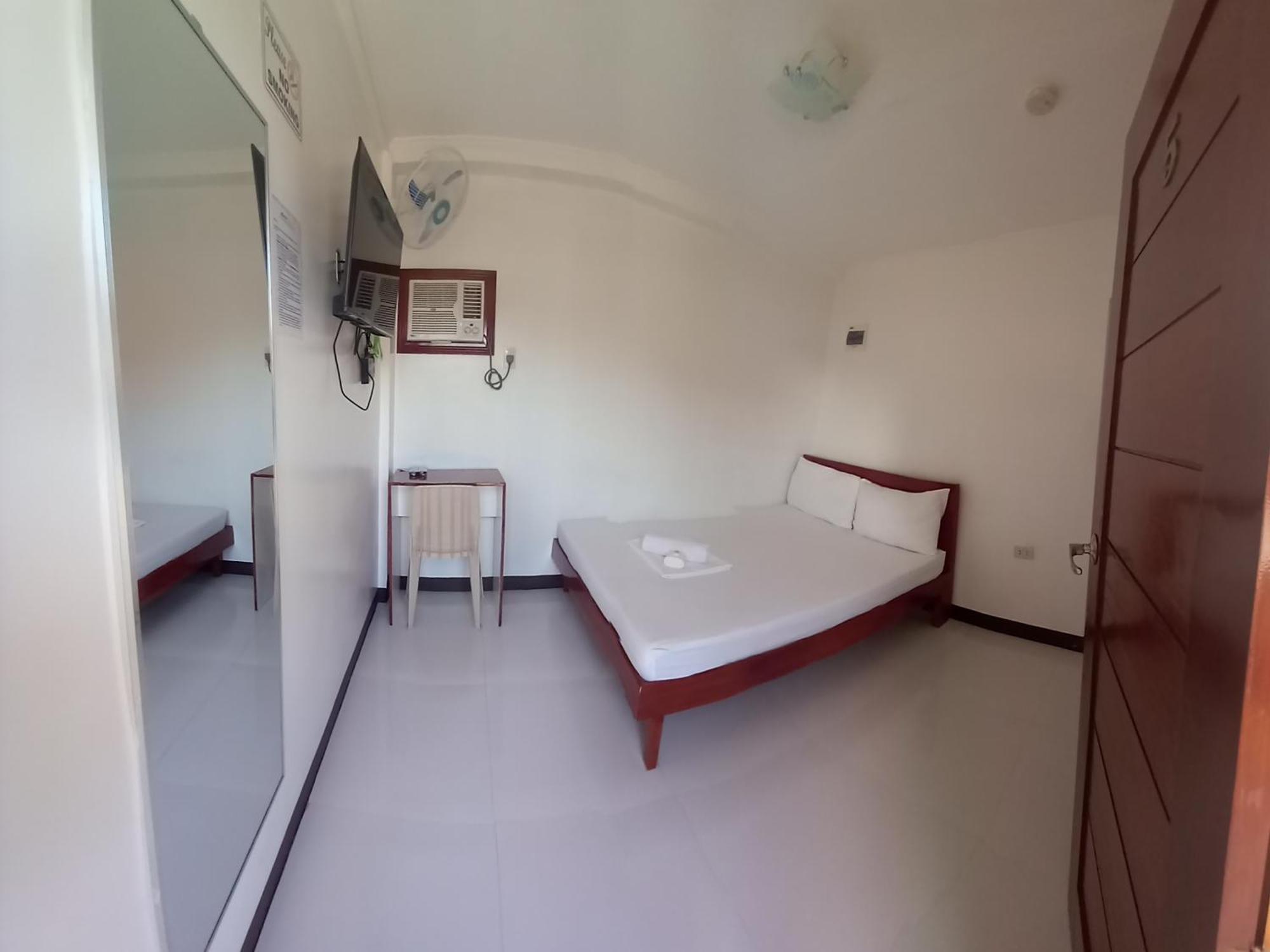 Alinchlo Hotel Легаспи Номер фото